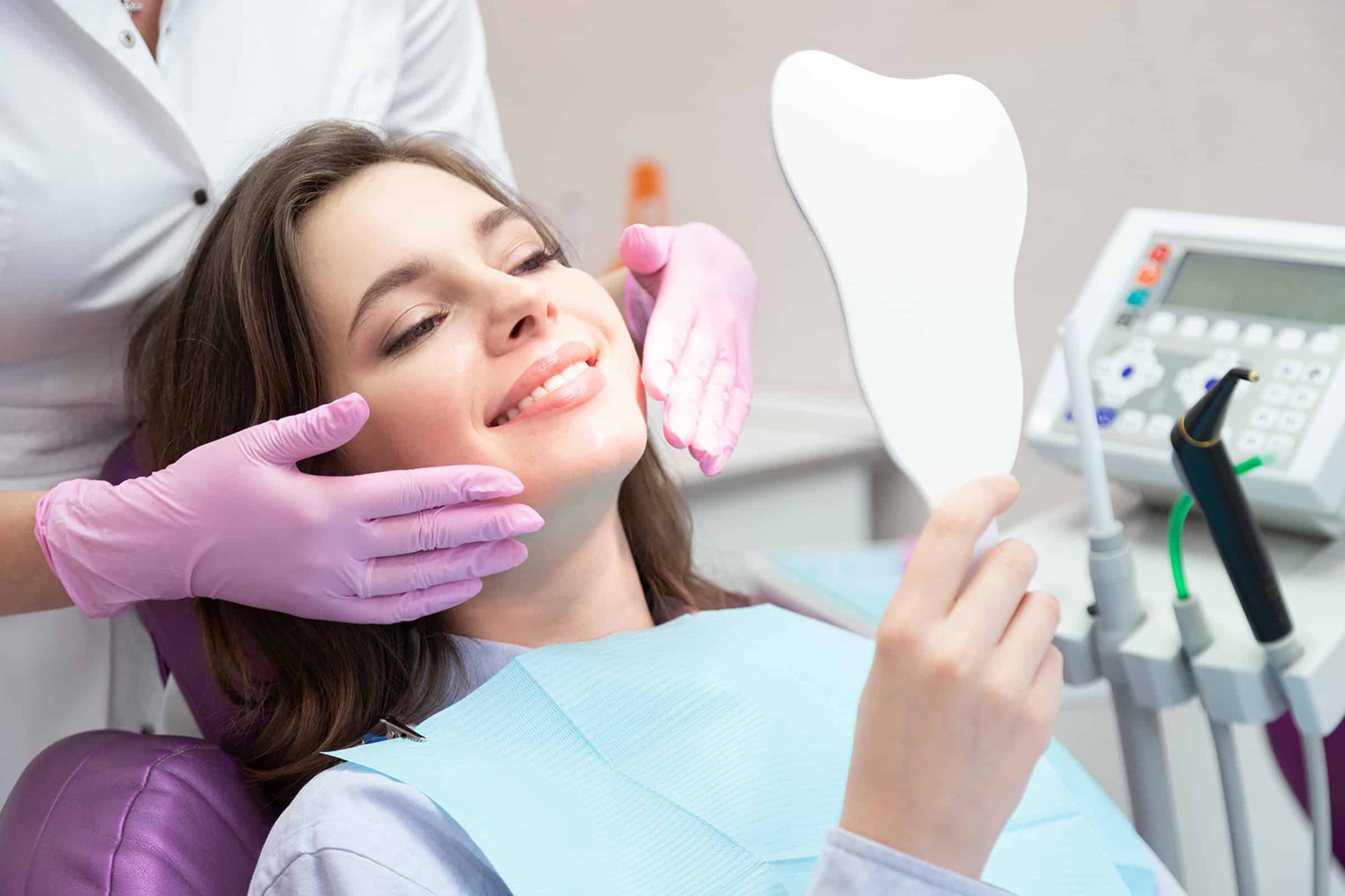 Woman getting a dental whitening procedure in Winston-Salem, NC