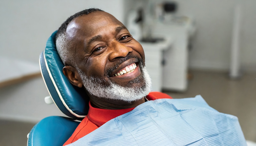man during denture dentist appointment at twin oaks dentistry